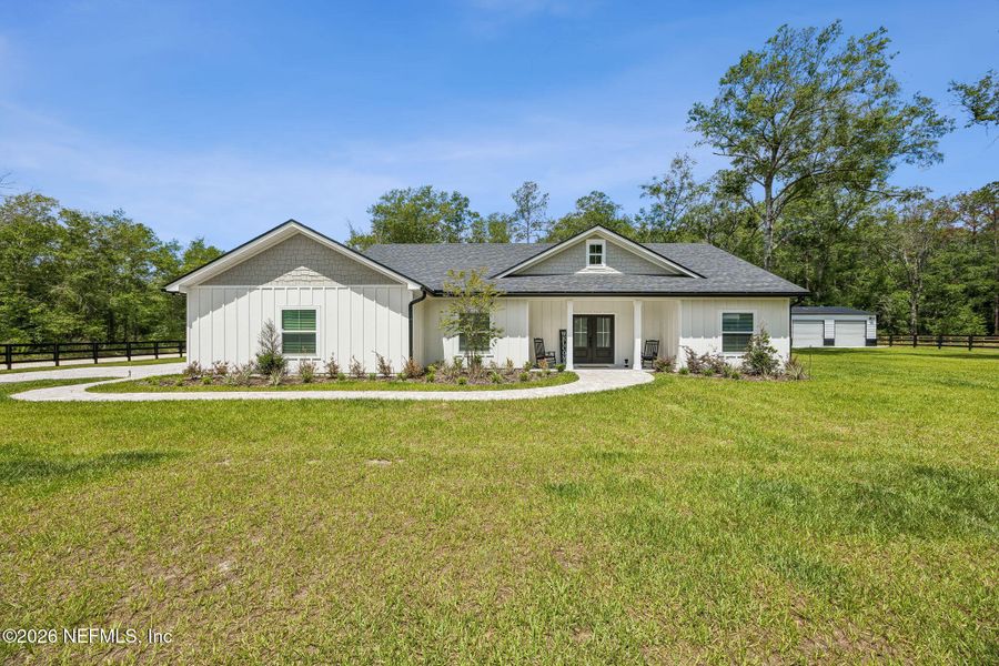 Front exterior of a new home in , Macclenny, FL, highlighting curb appeal (Image 1). Front exterior of a new home in , Macclenny, FL, highlighting curb appeal (Image 1).