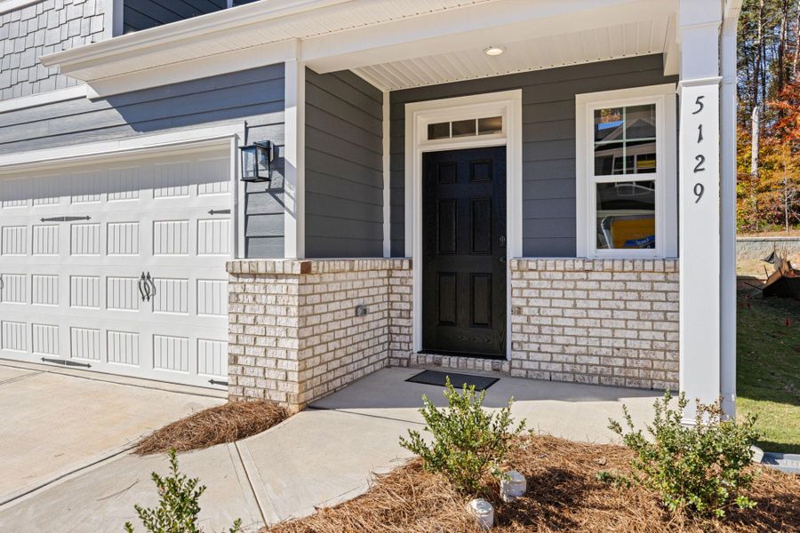 Exterior details and patio area of a home in Harbor Crossing, Greensboro (Image 3).
