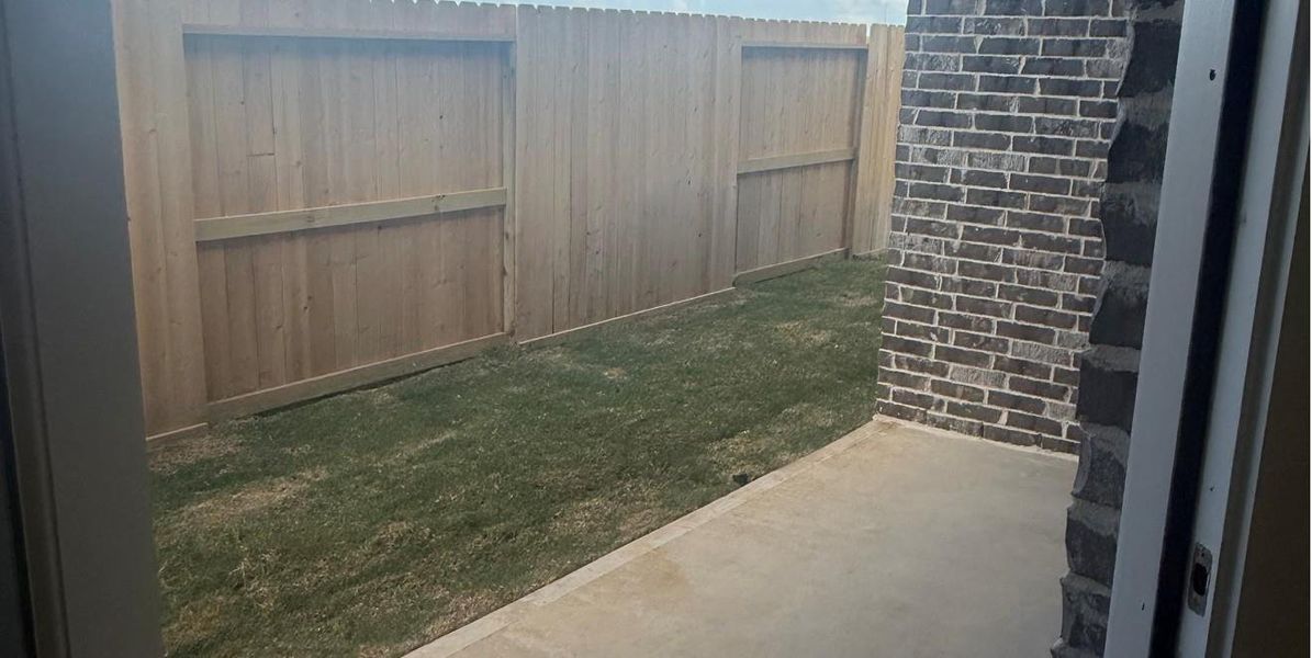 Exterior details and patio area of a home in Oakberry Trails: Richmond Collection, Waller (Image 3). Exterior details and patio area of a home in Oakberry Trails: Richmond Collection, Waller (Image 3).