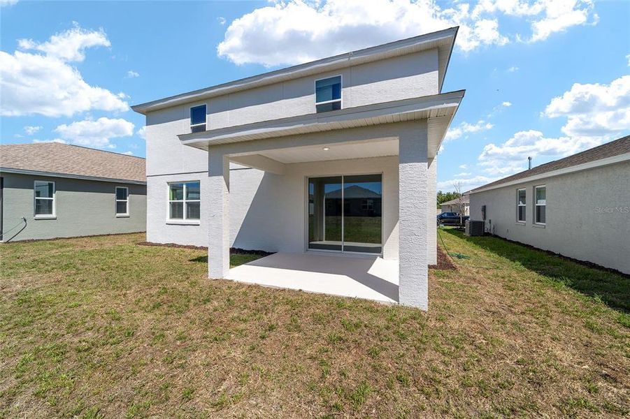 Exterior details and patio area of a home in Calesa Township, Ocala (Image 30).