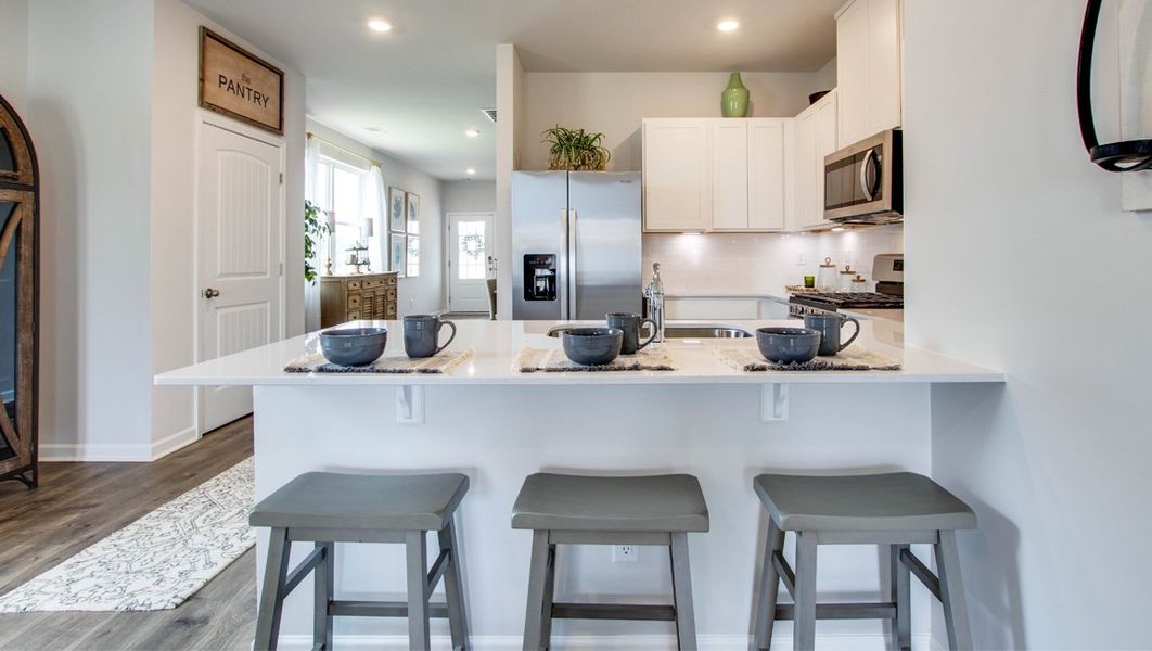 Representative furnished interior of a home built from the ASTOR by D.R. Horton in Nexus South, Gallatin (Image 11).