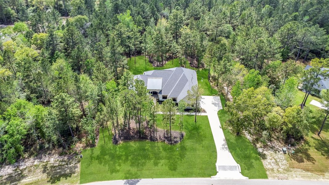 Front exterior of a new home in , Montgomery, TX, highlighting curb appeal (Image 24).