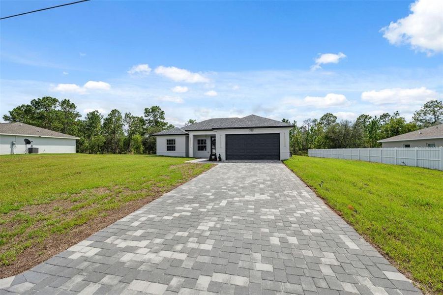 Front exterior of a new home in , Ocala, FL, highlighting curb appeal (Image 29).