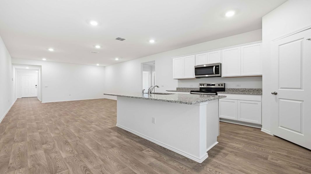 Representative furnished interior of a home built from the The Magnolia by D.R. Horton in Palomino, Manor (Image 7).