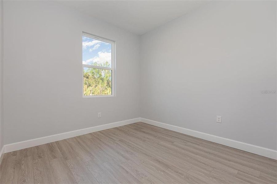 Spacious, unfurnished interior of a new home in , Port Charlotte (Image 18).