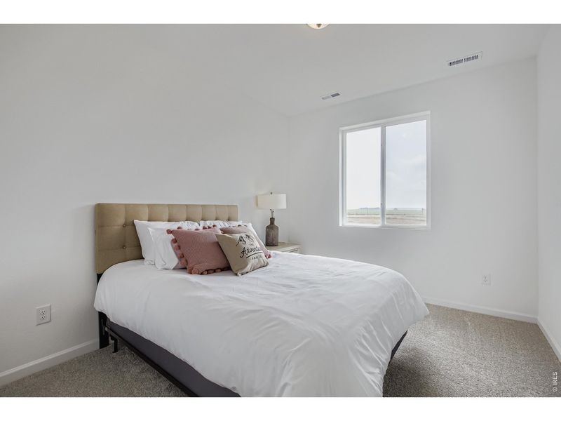 Furnished interior view inside a new home in Country Club Reserve, Fort Collins (Image 3).