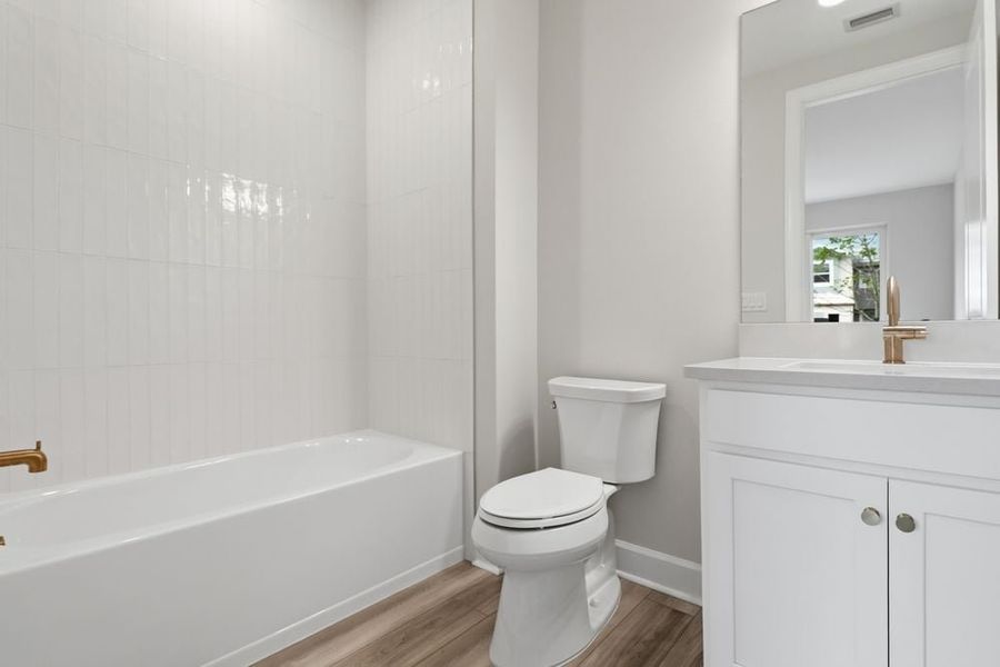 Furnished interior view inside a new home in Esplanade by the Islands Coach Homes, Naples (Image 7).