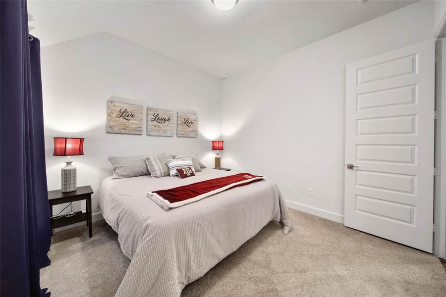 Secondary bedrooms are light and bright with generous closet space.