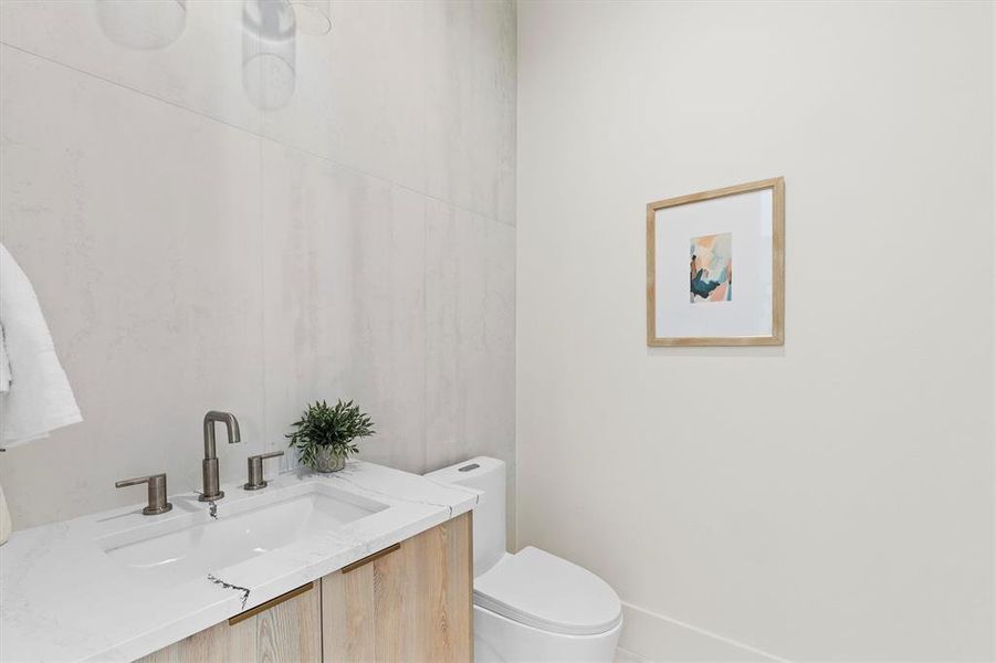 Bathroom with vanity and toilet