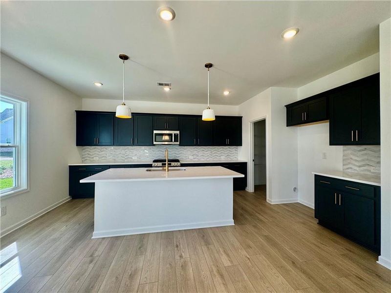 Furnished interior view inside a new home in Eastlyn Crossing, Flowery Branch (Image 11).