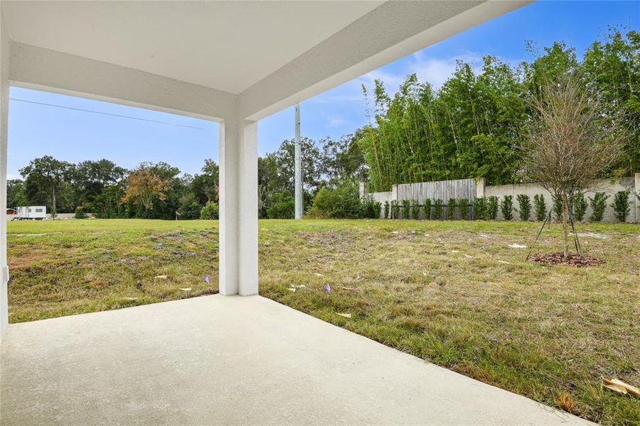 Exterior details and patio area of a home in Seasons at Grandview Gardens, Deland (Image 3).