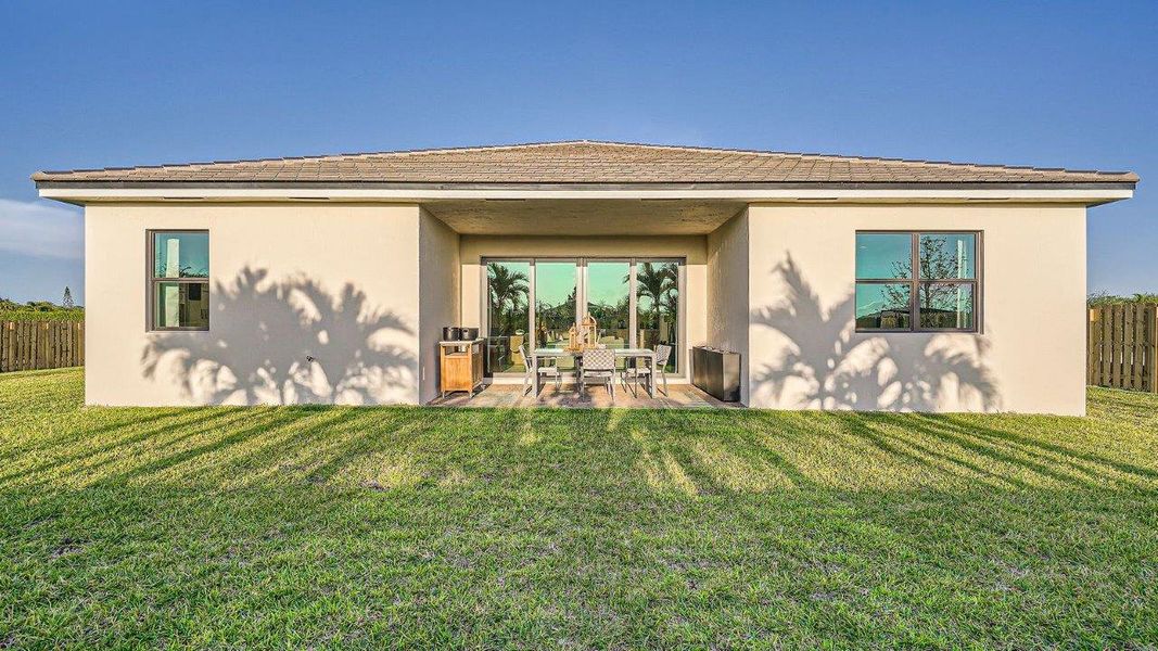 Exterior details and patio area of a home in Estrella Square, Homestead (Image 21). Exterior details and patio area of a home in Estrella Square, Homestead (Image 21).