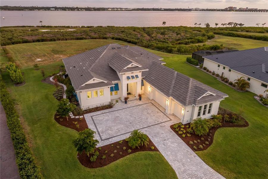 Front exterior of a new home in , Palmetto, FL, highlighting curb appeal (Image 22).