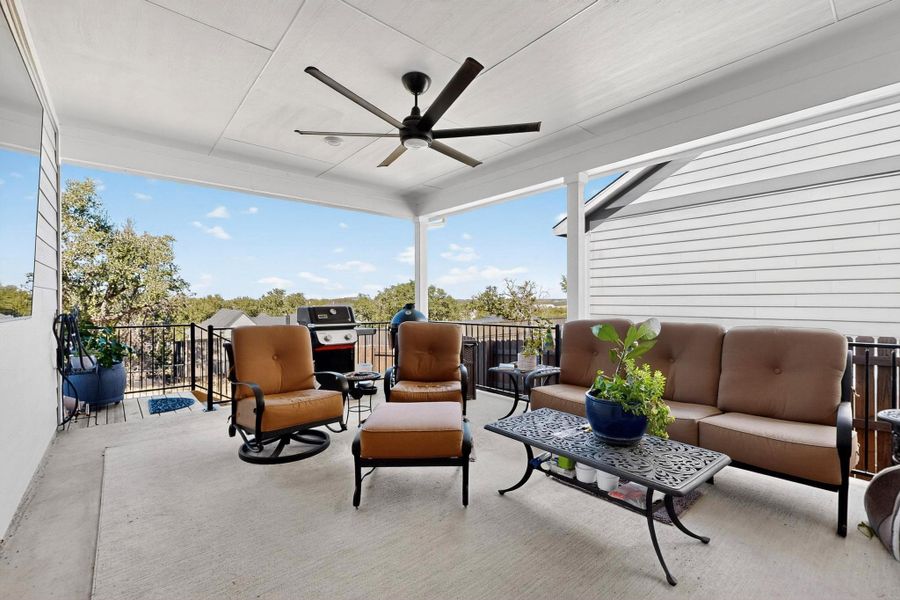 View of Covered patio / terrace with a ceiling fan, outdoor lounge area, and a grill