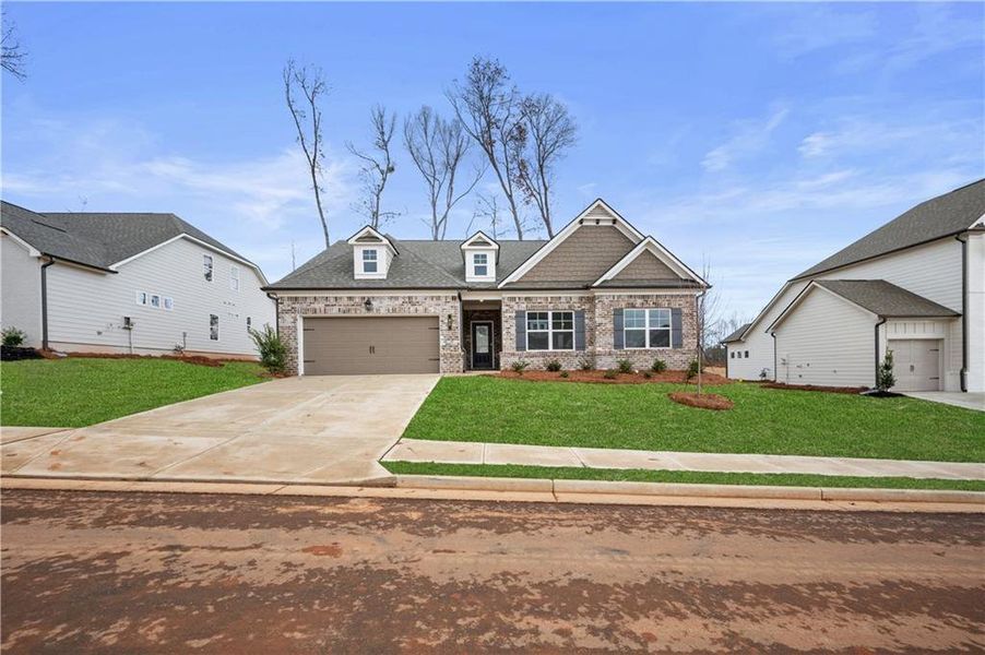 Front exterior of a new home in Rosewood Lake Preserve, Hoschton, GA, highlighting curb appeal (Image 26).