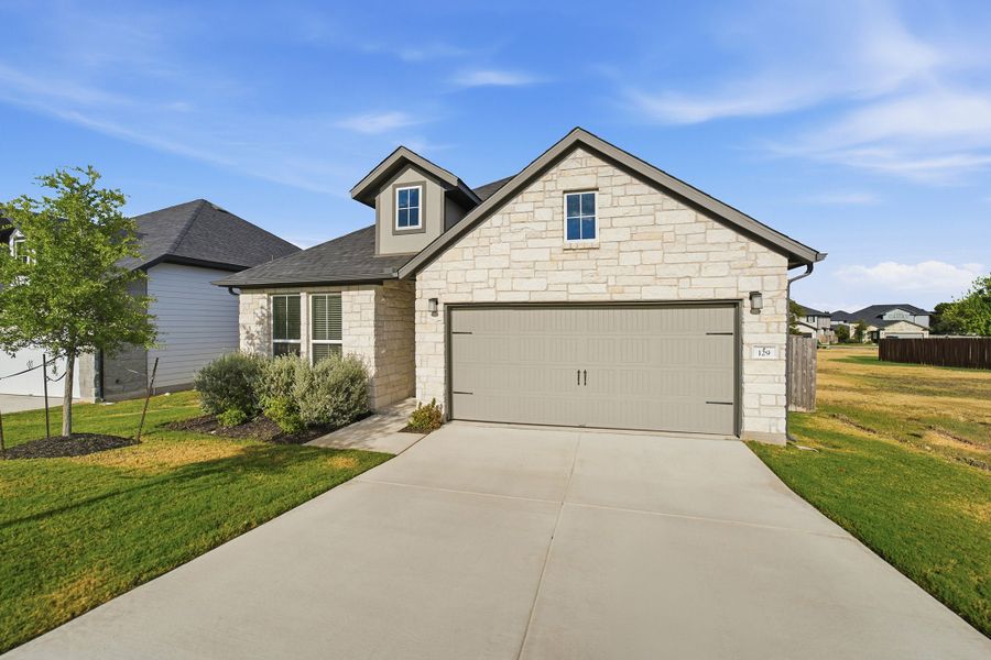 Front exterior of a new home in Sanctuary, Salado, TX, highlighting curb appeal (Image 20).