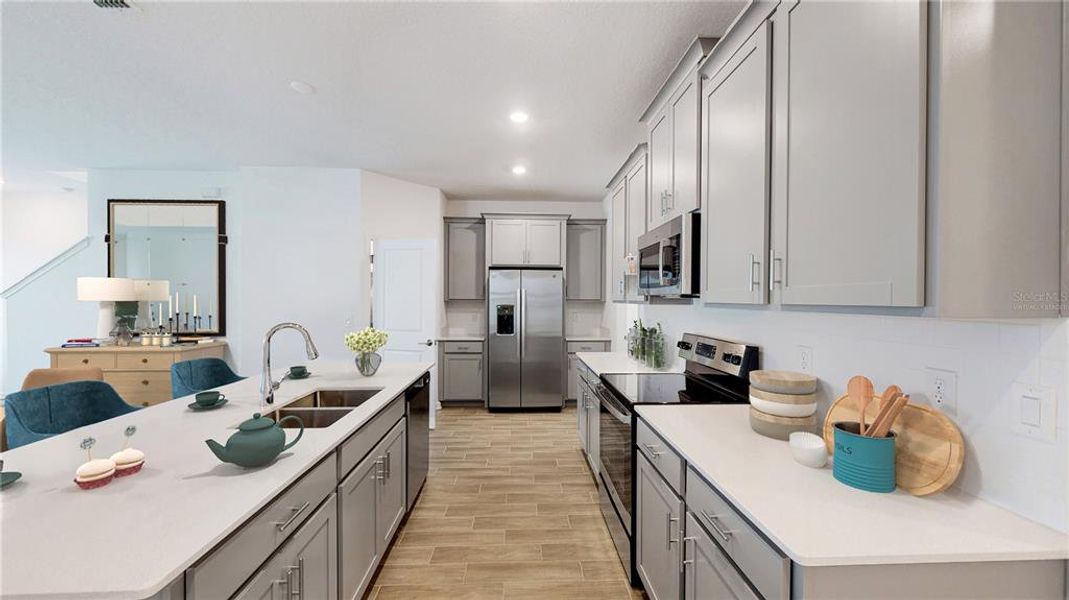Furnished interior view inside a new home in Tohoqua: Cottages Collection, Kissimmee (Image 6).