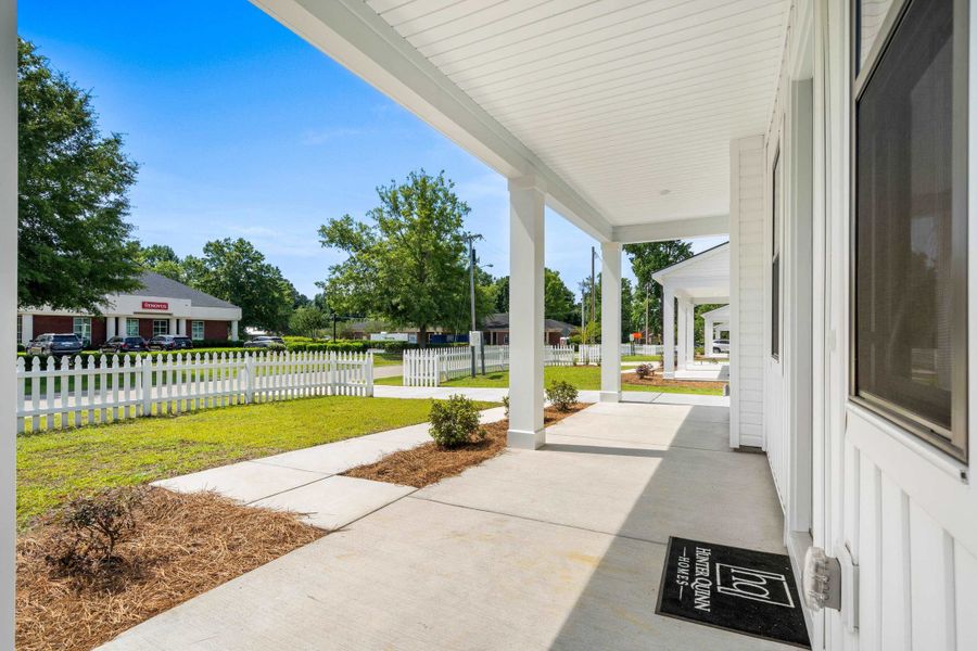 Exterior details and patio area of a home in Downtown Loris Homes, Loris (Image 3).