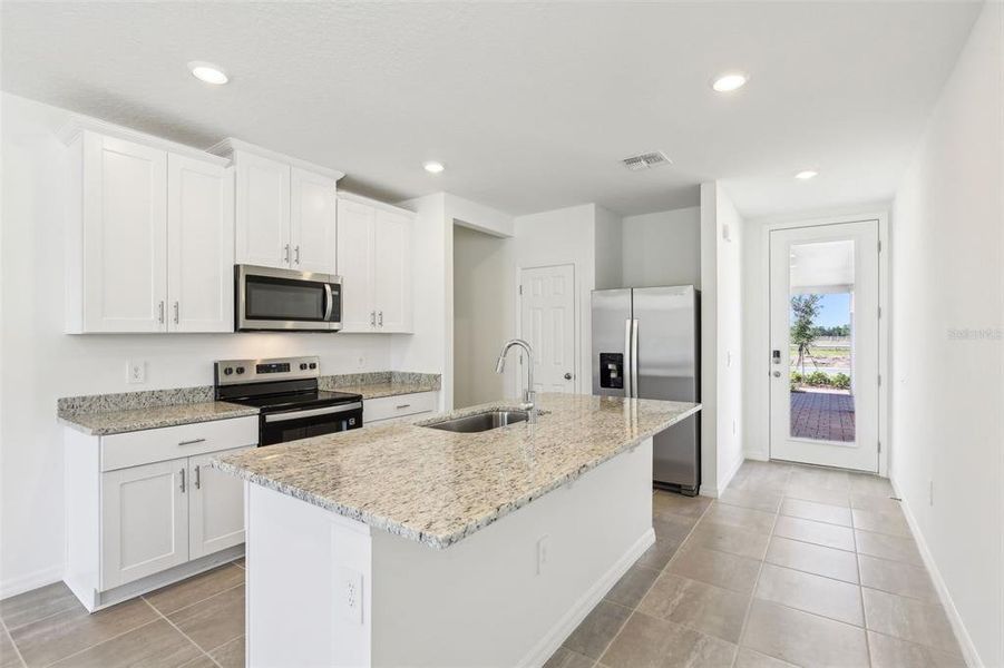 Furnished interior view inside a new home in Villamar - Classic Series, Winter Haven (Image 6). Furnished interior view inside a new home in Villamar - Classic Series, Winter Haven (Image 6).