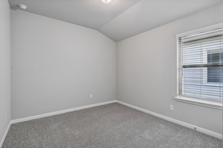 Guest bedroom in the Allen floorplan at a Meritage Homes community. Guest bedroom in the Allen floorplan at a Meritage Homes community.