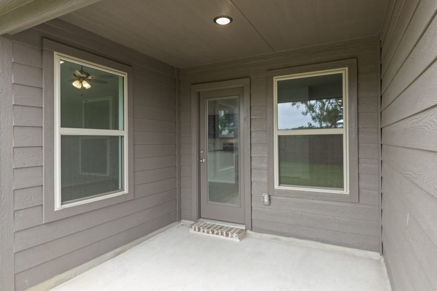 Front exterior of a new home in Belmont, Aubrey, TX, highlighting curb appeal (Image 28). Front exterior of a new home in Belmont, Aubrey, TX, highlighting curb appeal (Image 28).