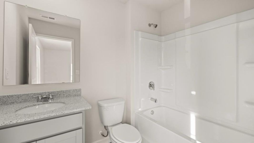 Furnished interior view inside a new home in Fairway 17 at Mirror Lake, Villa Rica (Image 10).