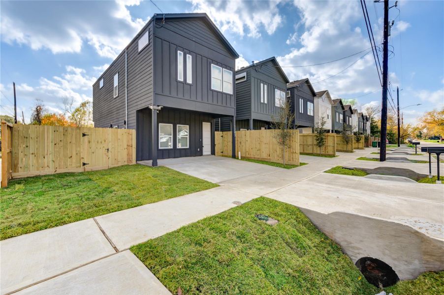 Front exterior of a new home in , Houston, TX, highlighting curb appeal (Image 22).