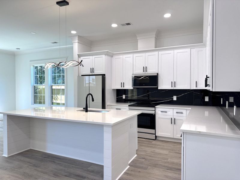 Furnished interior view inside a new home in , North Charleston (Image 11).