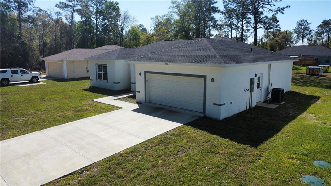 Front exterior of a new home in , Ocala, FL, highlighting curb appeal (Image 2). Front exterior of a new home in , Ocala, FL, highlighting curb appeal (Image 2).