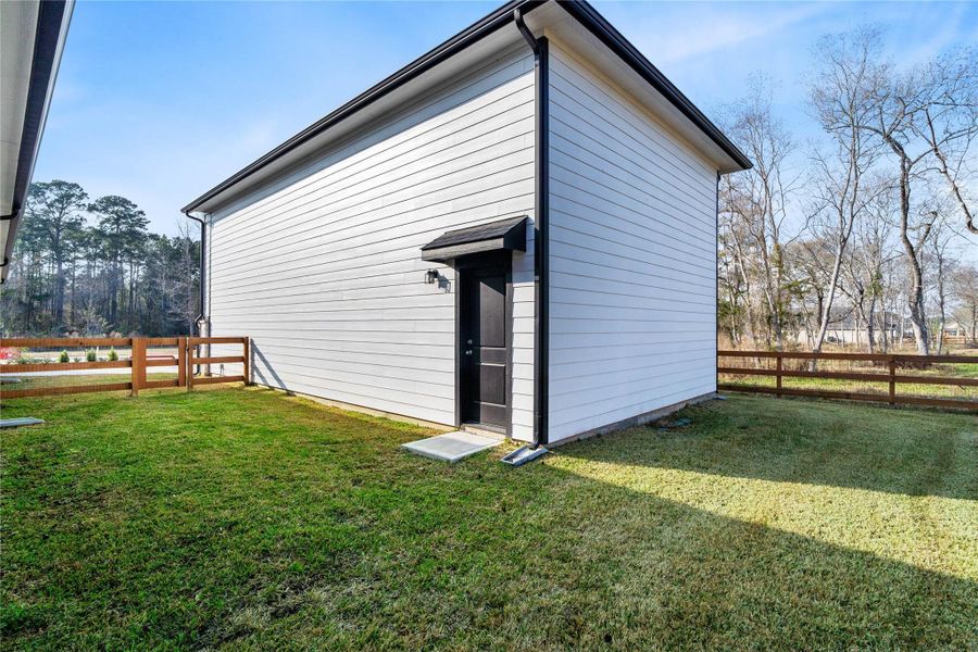 In addition to the front entrance of this Oversized Garage space, there is a convenient door from the back. In addition to the front entrance of this Oversized Garage space, there is a convenient door from the back.