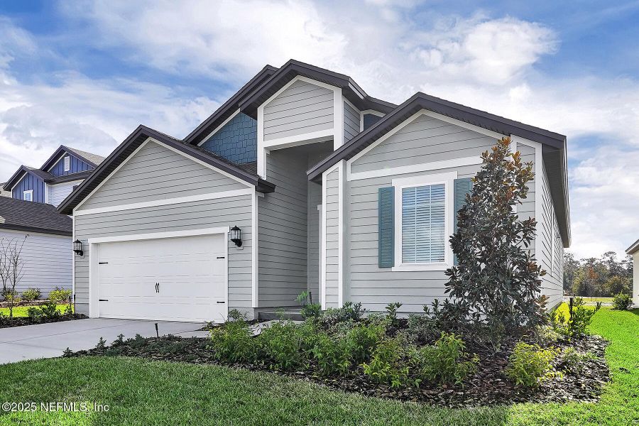 Front exterior of a new home in Jennings Farm, Middleburg, FL, highlighting curb appeal (Image 19). Front exterior of a new home in Jennings Farm, Middleburg, FL, highlighting curb appeal (Image 19).