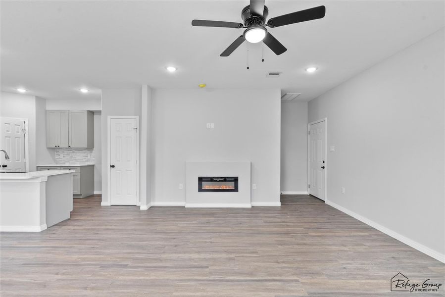 Beautiful fire place accentuates this living room. Beautiful fire place accentuates this living room.