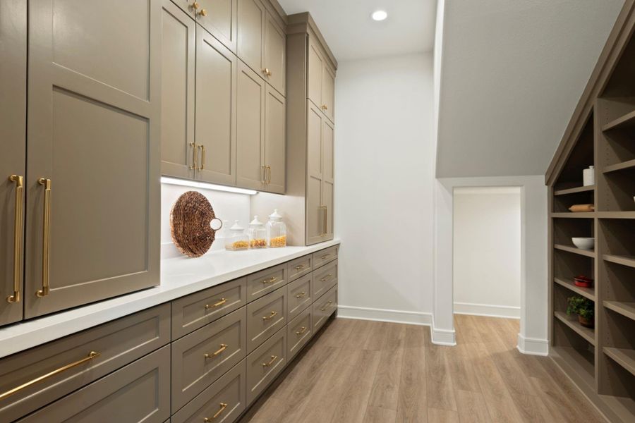 Butler's pantry with tons of built-ins, appliance center and more