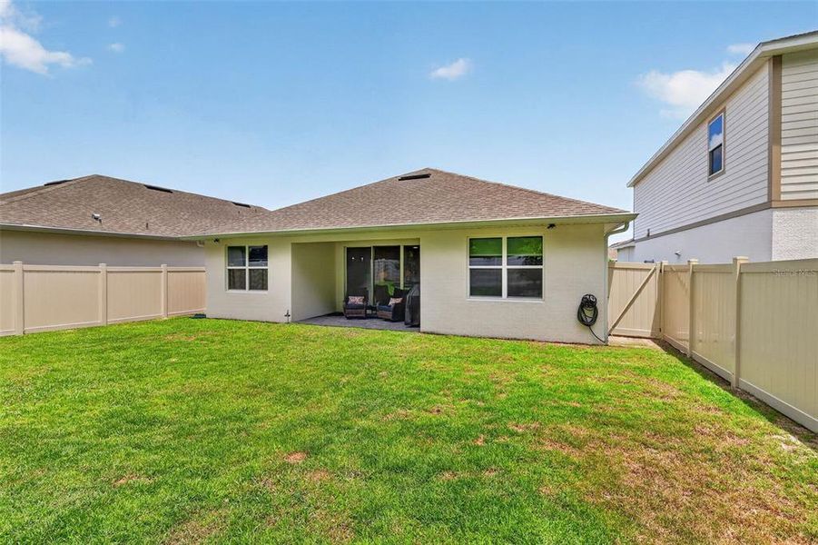 Exterior details and patio area of a home in , Mount Dora (Image 26).