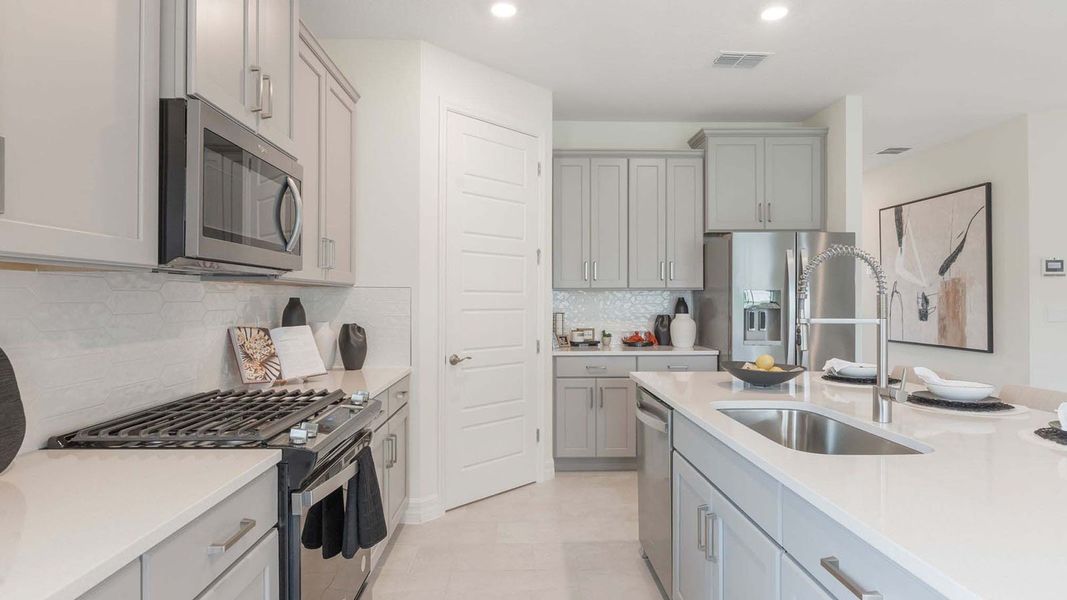 Representative furnished interior of a home built from the DELRAY by D.R. Horton in Lakes of Mount Dora, Mount Dora (Image 9).
