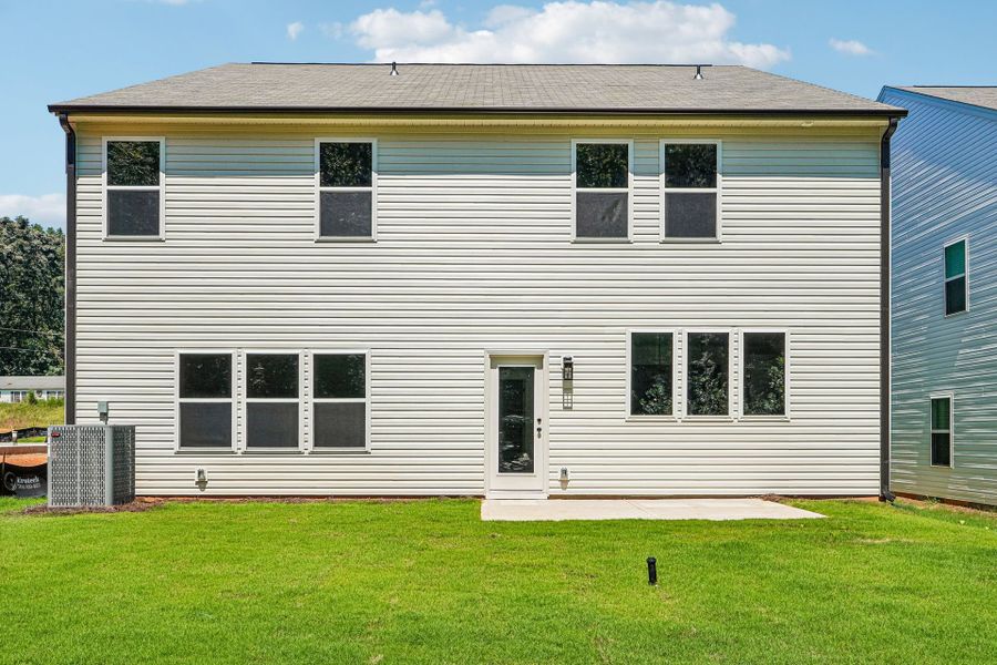 Exterior details and patio area of a home in Autumn Ridge, High Shoals (Image 2).
