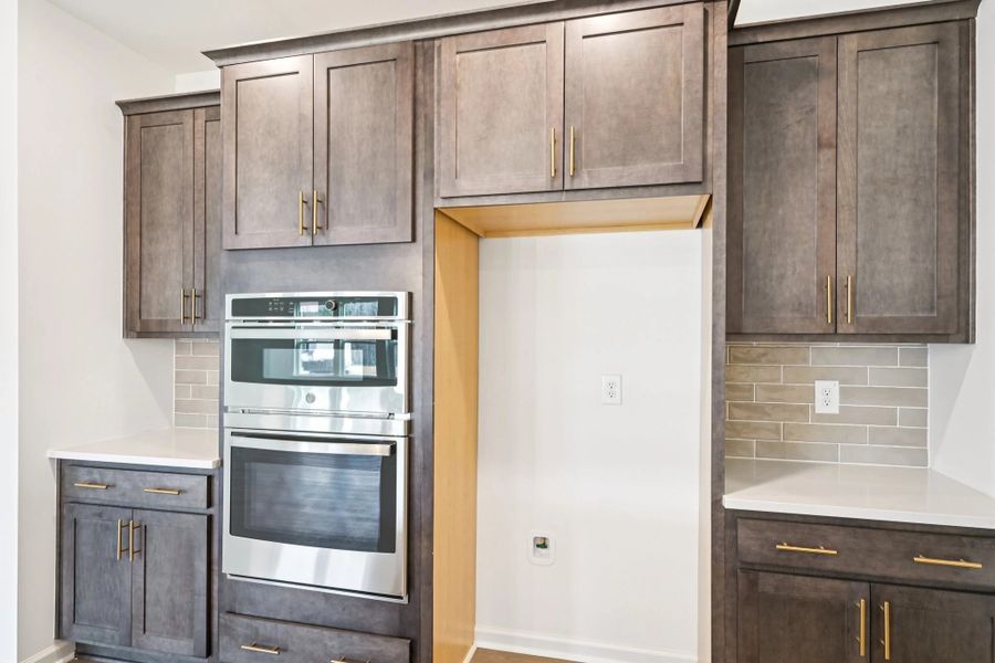 Kitchen featuring AW Collection® Oxford - Matte finishes, light wood, and refined style. Kitchen featuring AW Collection® Oxford - Matte finishes, light wood, and refined style.