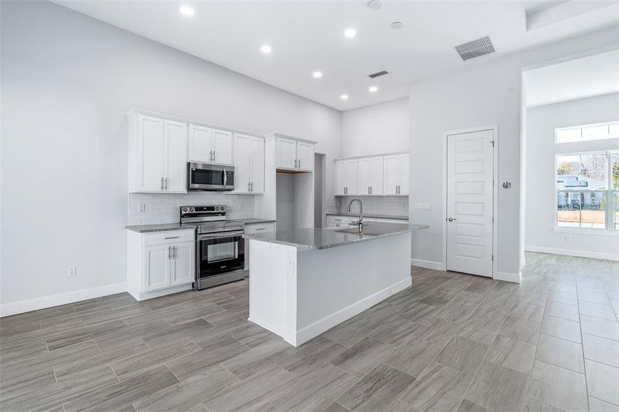 Furnished interior view inside a new home in , Palm Coast (Image 8). Furnished interior view inside a new home in , Palm Coast (Image 8).