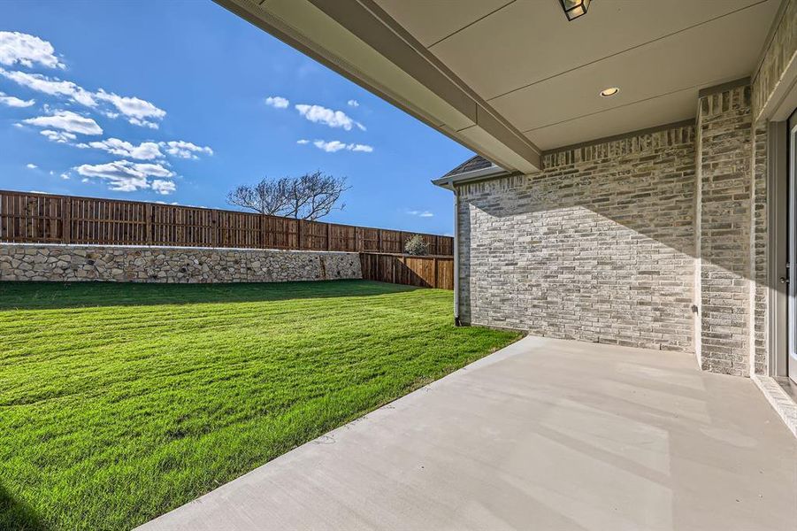 View of yard with a patio area