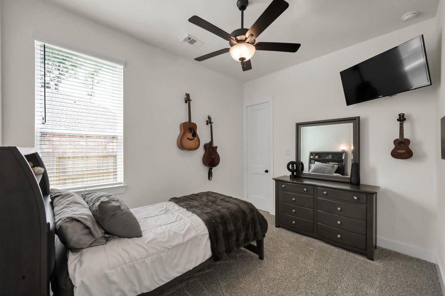 Furnished interior view inside a new home in The Woodlands Hills, Willis (Image 17).