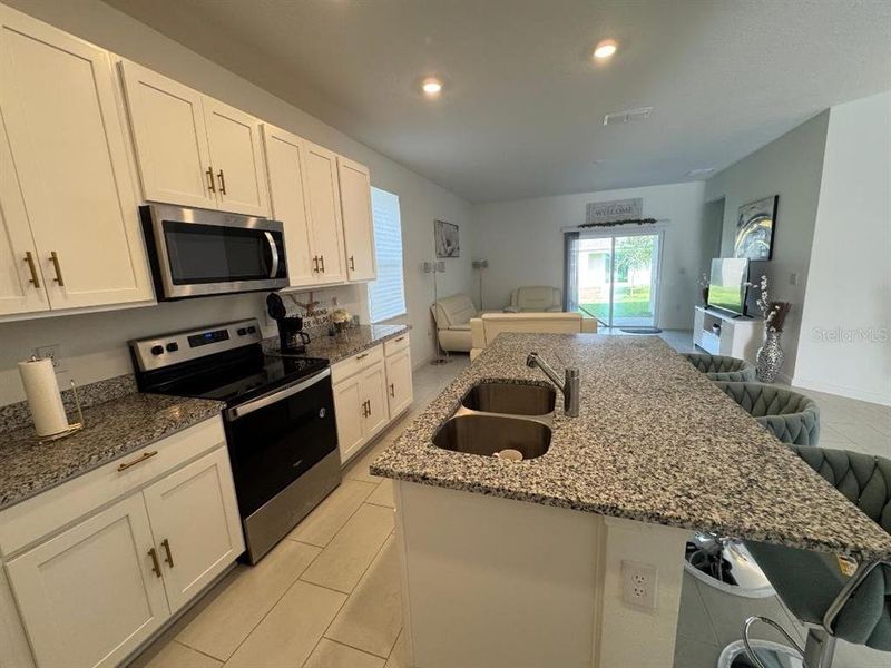 Furnished interior view inside a new home in Cypress Park Estates, Haines City (Image 15).