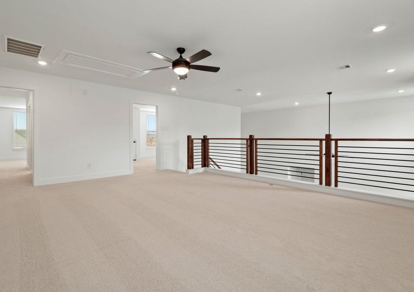 The game room over looks the living room. The game room over looks the living room.