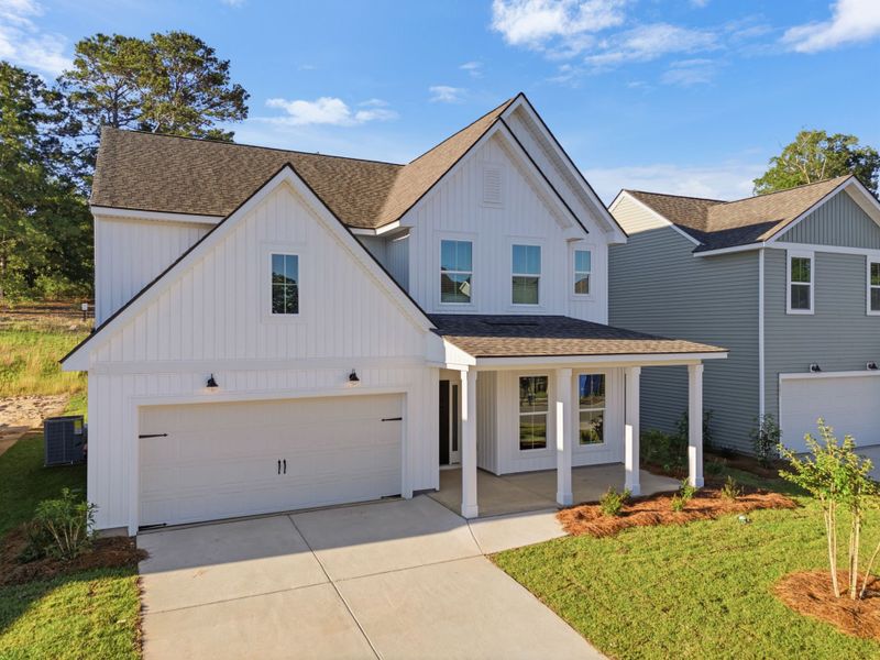 Front exterior of a new home in Grand Arbor, Blythewood, SC, highlighting curb appeal (Image 22).