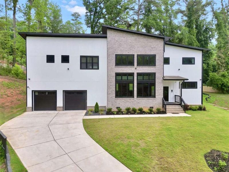 Front exterior of a new home in , Atlanta, GA, highlighting curb appeal (Image 29).