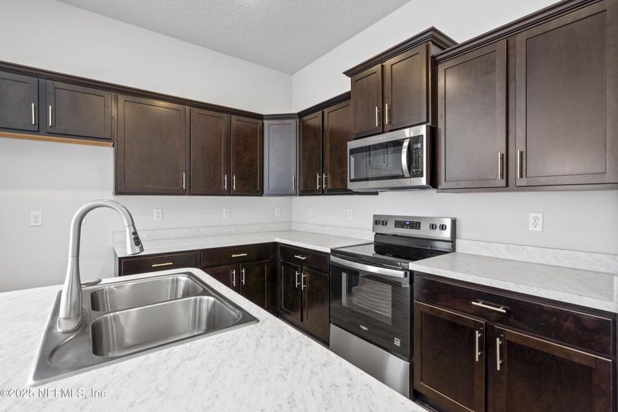 Furnished interior view inside a new home in Summerglen, Jacksonville (Image 5).