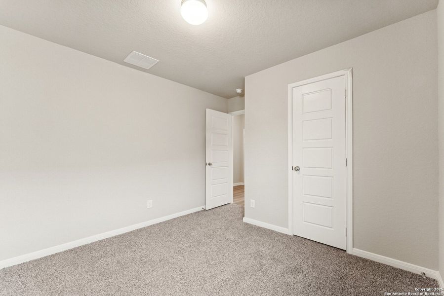 Spacious, unfurnished interior of a new home in Agave, San Antonio (Image 15). Spacious, unfurnished interior of a new home in Agave, San Antonio (Image 15).