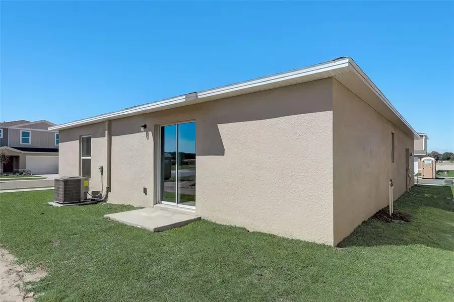Exterior details and patio area of a home in , Palm Bay (Image 3). Exterior details and patio area of a home in , Palm Bay (Image 3).