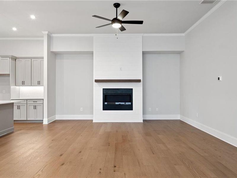 Spacious, unfurnished interior of a new home in The Village at Towne Lake, Woodstock (Image 56).