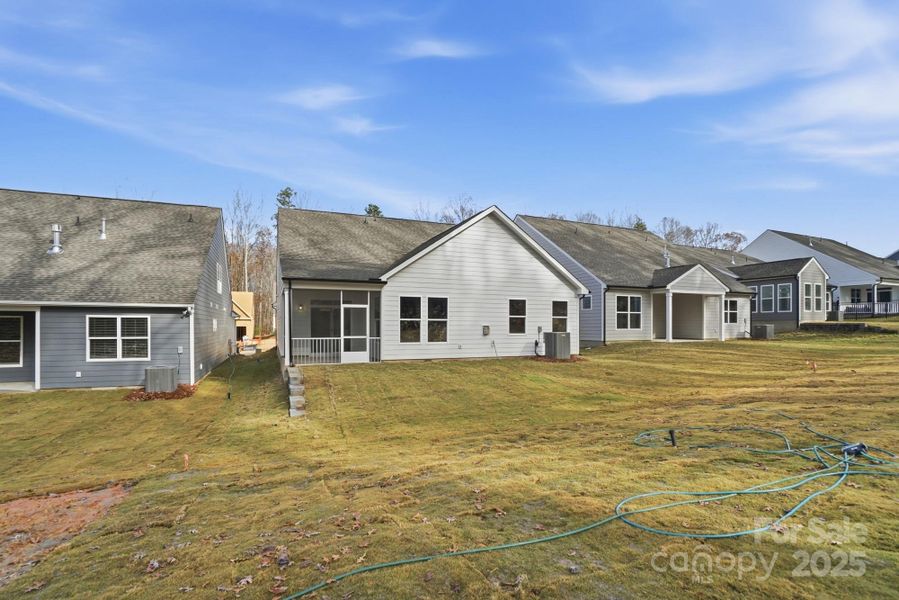 Exterior details and patio area of a home in Villas at Prestwick, Mooresville (Image 4).