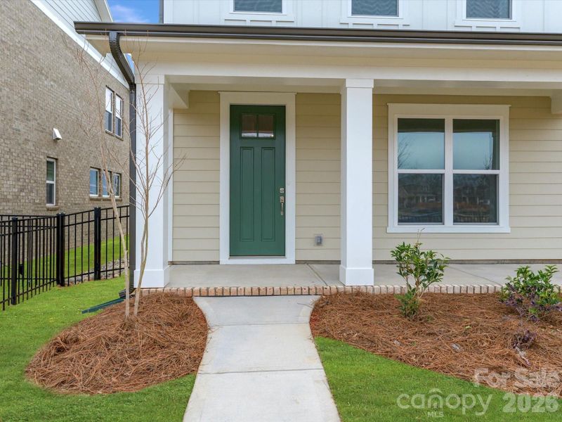 Exterior details and patio area of a home in Whitley Preserve – Park Collection, Mint Hill (Image 21).